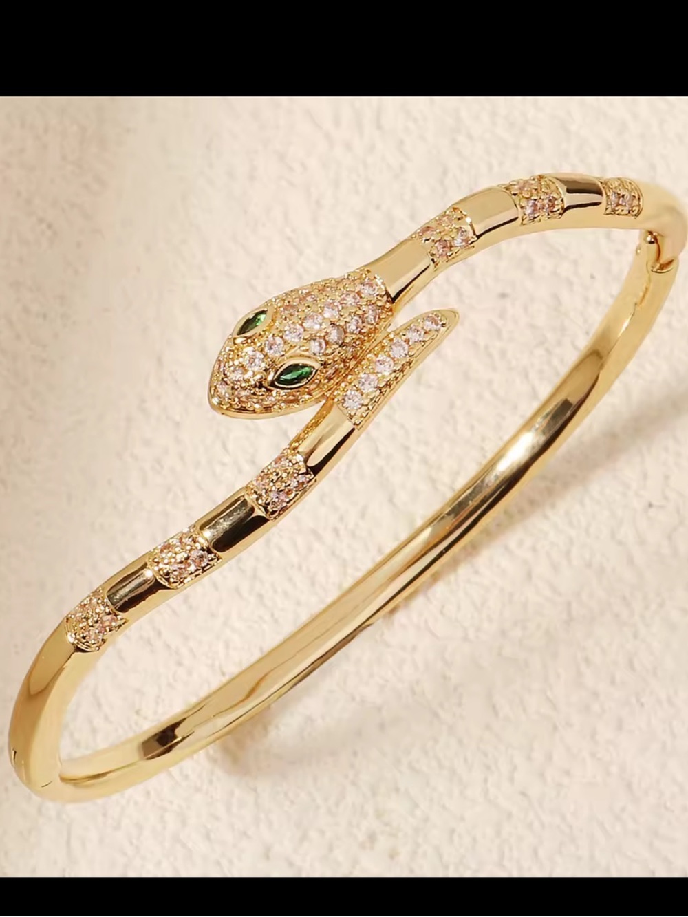 Gold Snake Bangle with Green Eyes